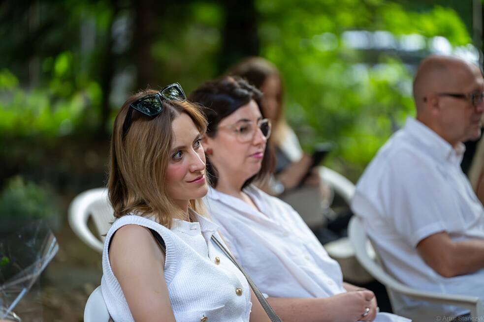 Two women sitting in the audience