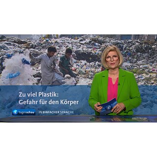 Scene from the news program with a female presenter wearing a light green blazer.