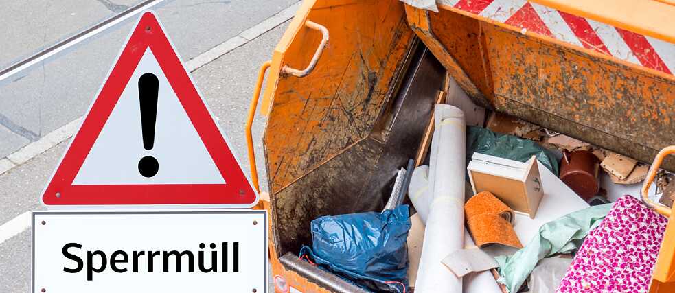 Large container filled with bulky waste next to a warning sign reading "Sperrmüll"