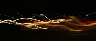 Lights moving through the darkness