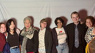 Sonali Beher and Iven Yorick Fenker stand alongside five others.