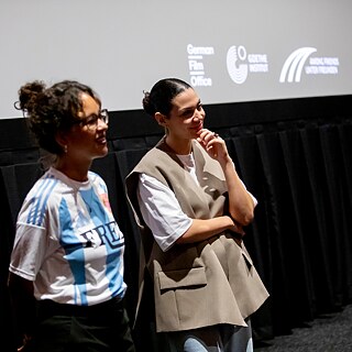 Two girls at an info-stand