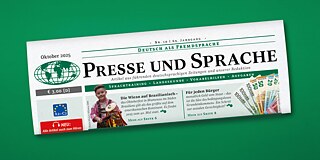 An issue of the newspaper on a green background.