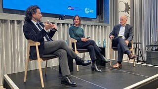 Clay Risen, Dr. Anna Sauerbrey, and Dr. Steven E. Sokol on stage