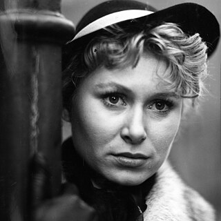 Close up of a young white woman wearing a hat