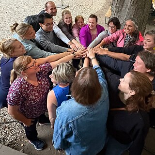 TOP Fellows with their hands all in.