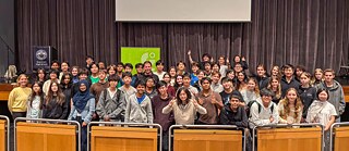 Roman Weidenfellner amidst students of Stuyvesant High School in New York