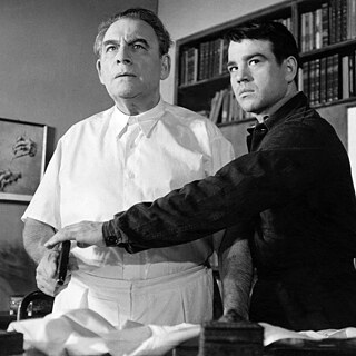 A a younger white man on the right grabs and  older white man in a white doctor's gown by his arm to prevent him from doing something. 