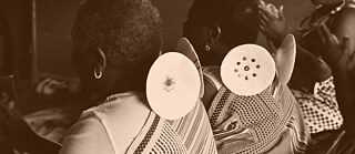 Venda women sitting down