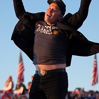 Photo of Elon Musk in a strange jumping gesture alongside Donald Trump. Key image for the film 'Elon Musk Unveiled' a documentary film at Antenna Festival