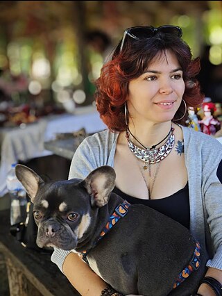 Tetiana Vacenko-Bondareva se psem Vyšňou, kterého si pořídili spolu s manželem Denysem