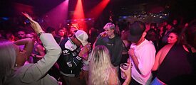 Guests dance at Bossy, a club in Munich.