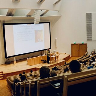 Students sitting in lecture hall 