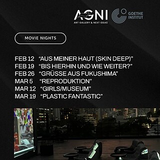 Rooftop cinema at sunset with a skyline view, lounge chairs, and a film projection.