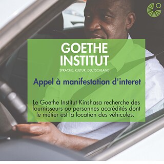 Vue de l’intérieur d’un véhicule avec le conducteur visible et le volant, fenêtre latérale ouverte.