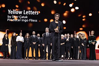 Golden Bear for Best Film (awarded to the film’s producers) 2026: Gelbe Briefe (Yellow Letters) by İlker Çatak produced by Ingo Fliess – the director İlker Çatak with producer Ingo Fliess and the film team
