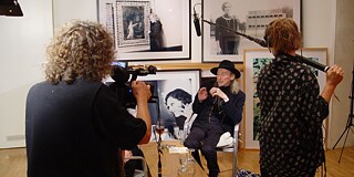 Film and sound recording of an older man with a black hat