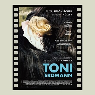 Movie poster for Toni Erdmann, showing a person with light-colored hair leaning into a large, dark furry figure. The poster includes the film title and credits.