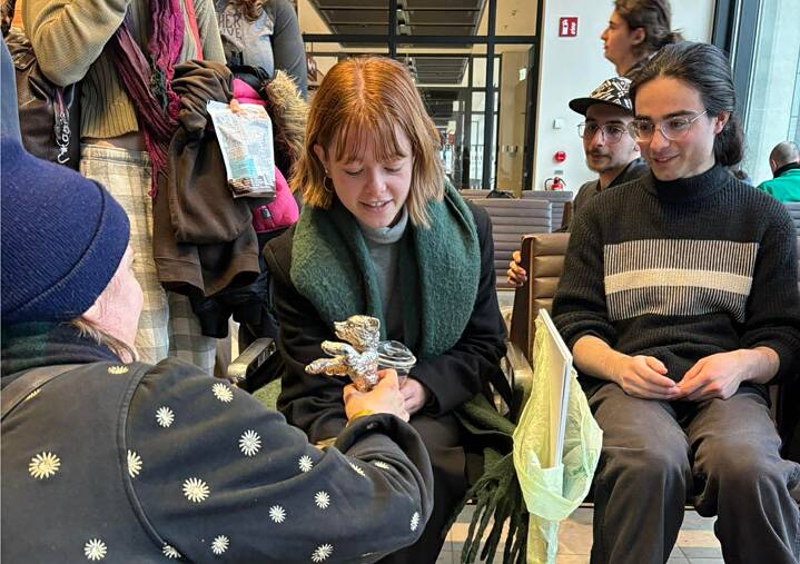 Geneviève Dulude-De Celles shows the students her Silver Bear award