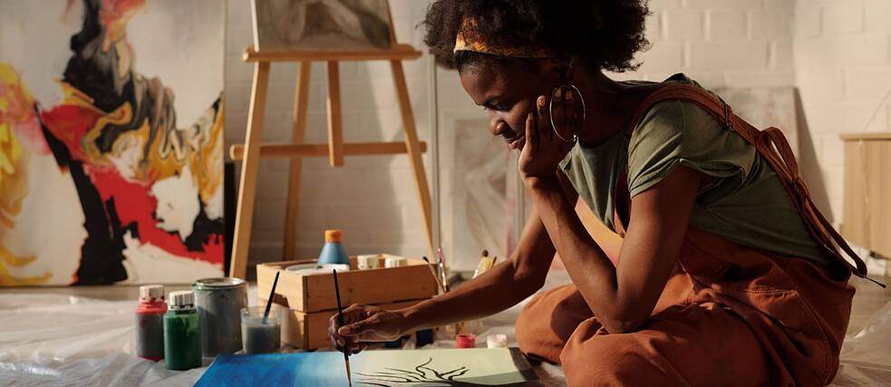 Painting artist creating artwork in studio