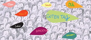 Illustration von farbigen Sprechblasen mit Begrüßungen in verschiedenen Sprachen.