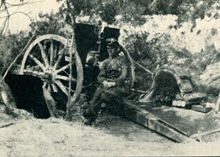 A soldier in an artillery position