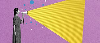 A woman is speaking into a megaphone