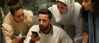 A group of peoples with mobiles