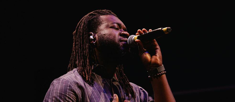 Live performance of male singer on stage