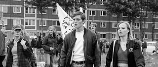 Image of main characters from the film, "We are young. We are strong."
