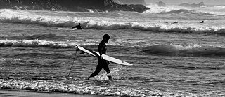 Surfers on the Pacific coast of Oregon