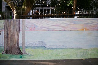 Uma janela para o Mundo: Intervenção artistica no muro do Goethe-Institut Porto Alegre de autoria de Nana Haus. 