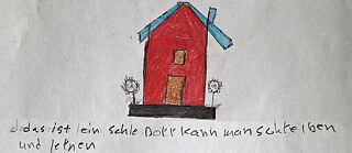 A crayon drawing of a red house with a blue roof, with a handwritten caption.