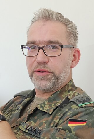 Roland Bösker, 56, ist Oberstleutnant der Reserve der Bundeswehr und Mitglied des Bundesvorstands von BundeswehrGrün e.V., einem sicherheitspolitischen Netzwerk, das der Partei Bündnis 90/Die Grünen nahe steht.