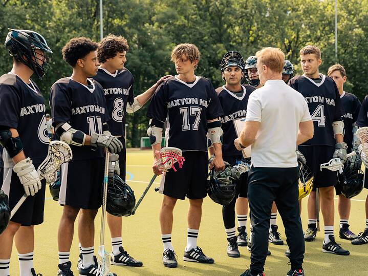 Still frame from the Amazon Prime Video Germany original series "Maxton Hall -The world between us". James (Damian Hardung) and the Lacrosse team.