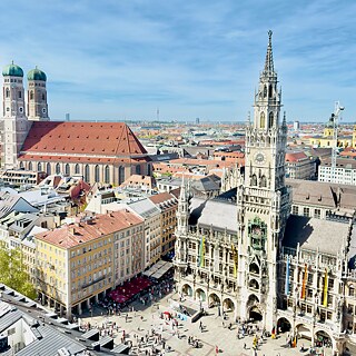 View of town hall and Frauenkirche at central square in Munich.