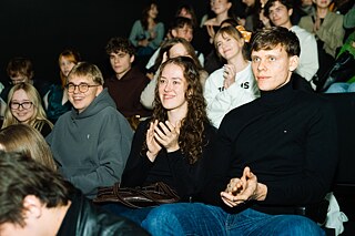 young people clapping