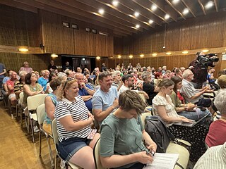 A concert hall full of people
