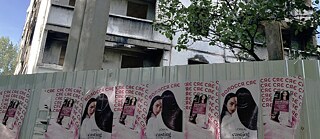 A Loreal Advert on a wall