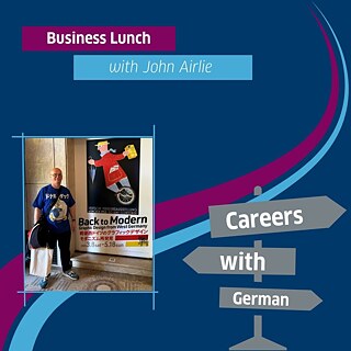 Graphic for an event titled “Business Lunch with John Airlie.” The background is predominantly blue with curved lines in magenta and light blue. In the lower left corner, there is a portrait photo of John Airlie. On the right side, several grey directional signposts are displayed.