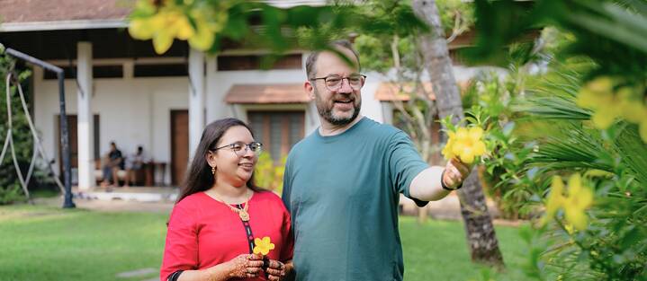 Aazmi & Thorsten in a garden in Kerala, India.