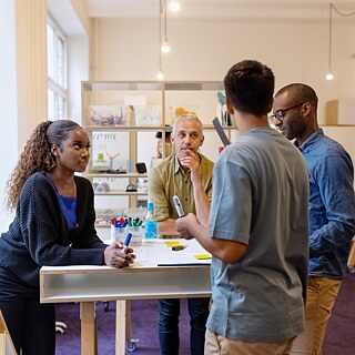Participants taking part in a collaborative professional development workshop in Germany.