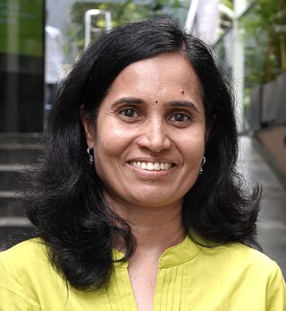 woman smiling, yellow top