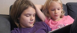 Het lezen op de iPad fascineerd veel kinderen 