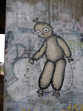 Stencil von L.E.T. am Brückenpfeiler