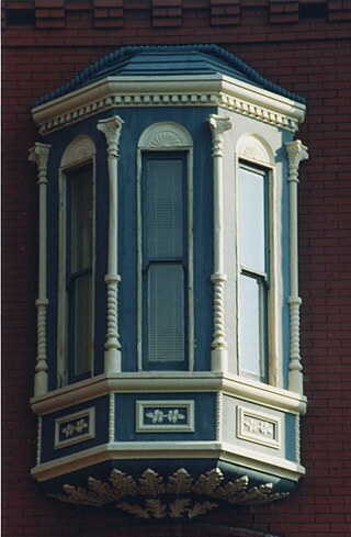 Bay window on 2nd floor of Germuiller building at 800 7th St NW, 2000.