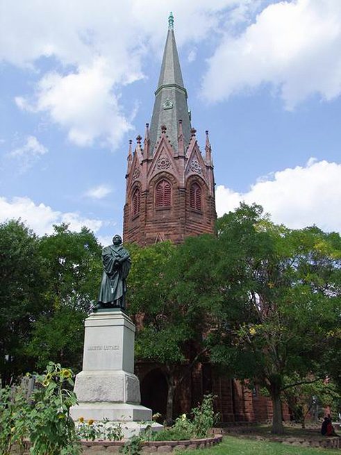 The statue of Martin Luther by Ernst Rietschel stands prominently in front of Luther Place Memorial Church, 2009.