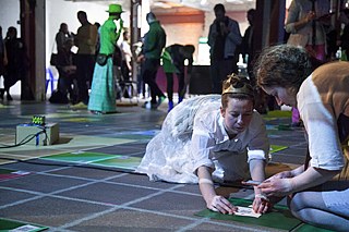 Interactive Game Performance: RE:WONDERLAND or FOLLOW THE WHITE RABBIT.