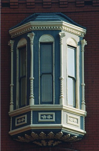Bay window on 2nd floor of Germuiller building at 800 7th St NW, 2000.	