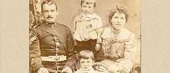 Walter Harrington as a small child, with Minnie his mother, father Michael and older brother Albert, seated below him